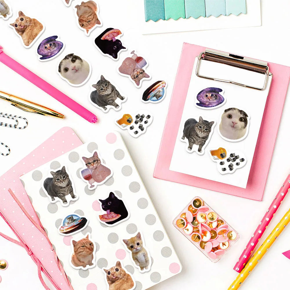 A collection of cartoon cat reward stickers in various colors and designs is displayed on a white background.