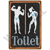 A vintage metal sign depicting two figures exercising on a dark background, labeled Toilet.