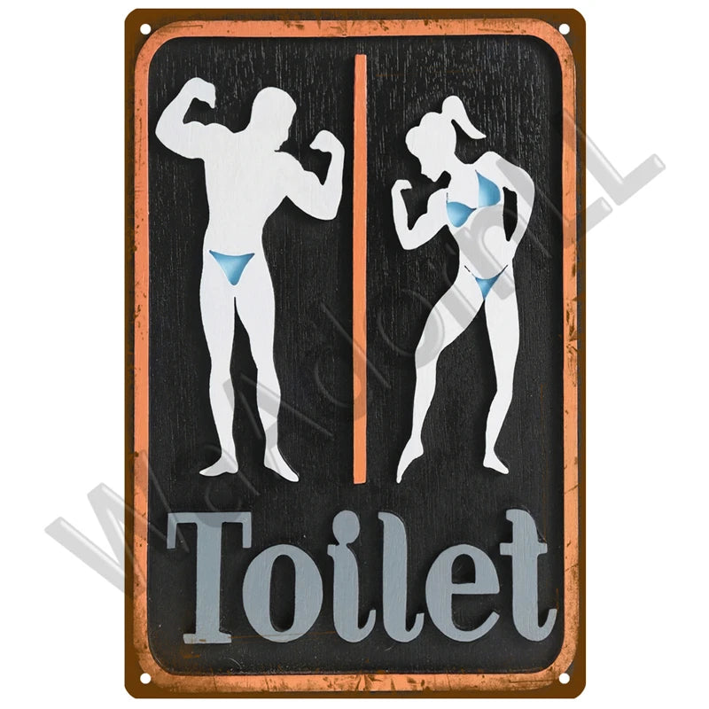 A vintage metal sign depicting two figures exercising on a dark background, labeled Toilet.