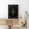 A framed canvas print featuring a mystical tarot design of the sun and moon against a dark background.