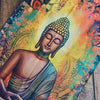 Vertical tapestry wall hanging depicting a serene Buddha figure with a radiant golden halo and vibrant colors.