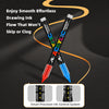 A set of two black acrylic paint markers with brush tips shown diagonally against a dark background.