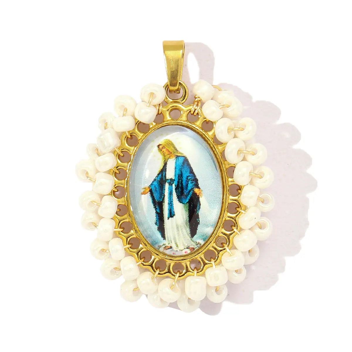 Gold-toned charm pendant featuring a depiction of the Virgin Mary surrounded by white beads.