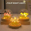 A set of handmade LED tulip night lights featuring glowing yellow and orange flowers inside clear glass globes.