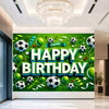 A vibrant green backdrop banner for a happy birthday featuring soccer balls, trophies, and crowns.