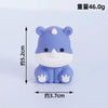 A small, light blue elephant-shaped decoration for birthday decorations.