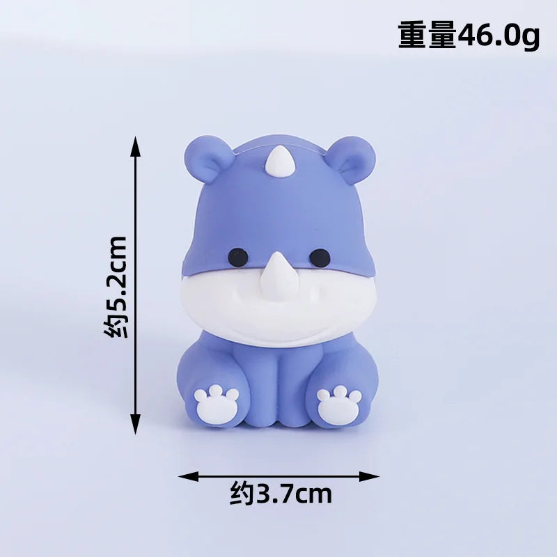 A small, light blue elephant-shaped decoration for birthday decorations.