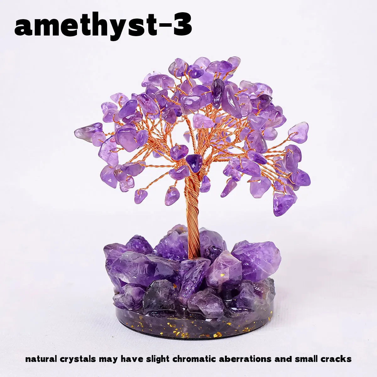 A amethyst crystal tree featuring purple crystals on a wooden branch and a dark purple base.