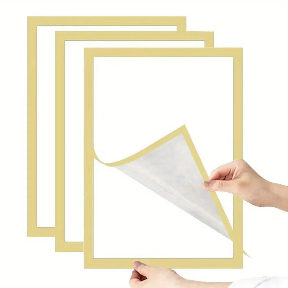 Three gold magnetic wall frames for photos and notes displayed against a white background.