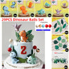 Un juego de pelotas de dinosaurios y hojas usadas como toppers para pastel, con varios dinosaurios y follaje.