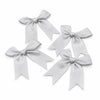A set of elegant light gray satin ribbon bows for gifts and DIY crafts