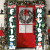 Festive Christmas door banner featuring holiday greetings and a wreath on a red door.