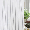 Vertical silver lines of frosted window privacy film against a white background.
