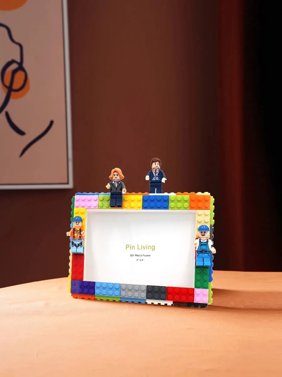 A colorful DIY building block photo frame kit featuring minifigure characters and a display area.