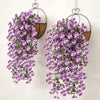 Artificial eucalyptus and violet pansy hanging vine in black wire hangers