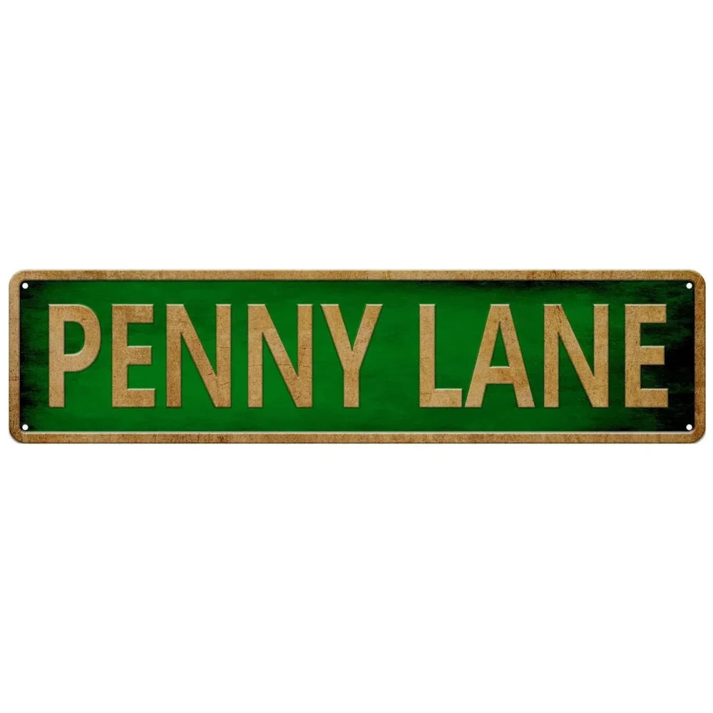 A rectangular green metal tin sign with the text PENNY LANE in gold lettering.