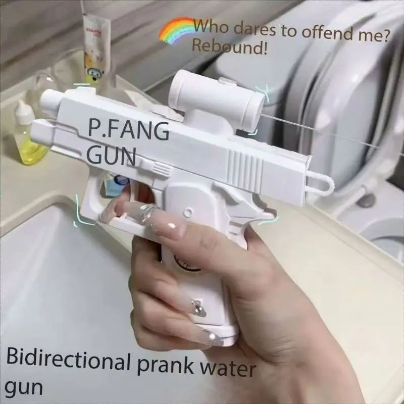 A hand holds a white P.FANG gun, a bidirectional prank water gun, in a bathroom setting.