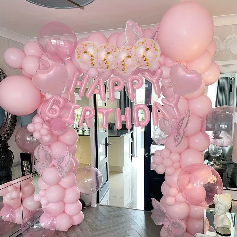 Pink marble birthday balloon decoration set featuring balloons and a banner