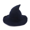 A dark navy blue vintage knit witch hat with a pointed crown.