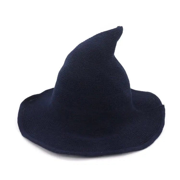A dark navy blue vintage knit witch hat with a pointed crown.