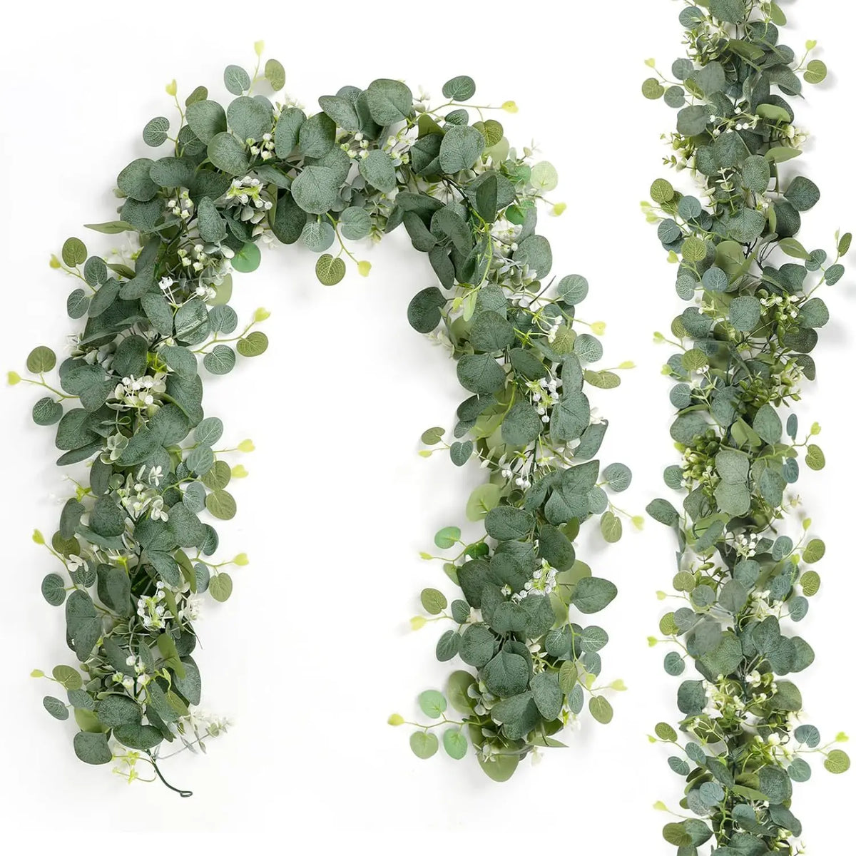 A long, lush garland of green eucalyptus leaves and small white flowers used for decoration.