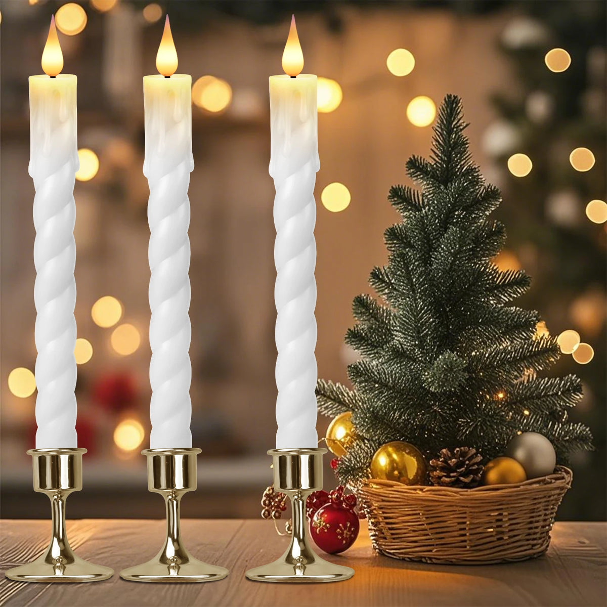 Three white taper candles in a set are displayed next to a decorated Christmas tree and bokeh lights.