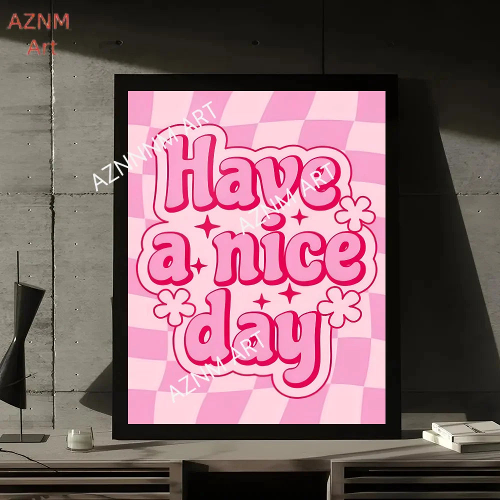 A pink and white checkered background with the text Have a nice day in pink script on a framed print.