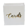 A clear acrylic gift box with the word Cards written in gold script on the front.