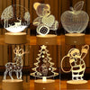 A collection of acrylic LED night lights featuring woodland animals and festive holiday shapes like a deer, bear, apple, and 