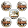 A set of commemorative coins featuring scenes from the Last Supper and a cross design.