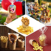 A collection of disposable kraft paper cups filled with french fries and other snacks.