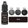 A black glass dropper bottle of liquid cosmetic pigment with three drops shown on a white background.