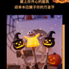 Un ensemble de bâtons à citrouille luminescents utilisés comme lanternes d'Halloween.
