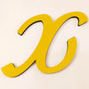 A bright yellow 3D acrylic letter 'X' wall sticker against a light background.