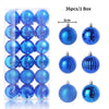 A box containing 36 blue and silver glitter Christmas tree ornament balls.