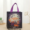 Black tote bag featuring a Halloween design with bats, pumpkins, and spooky elements.