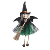 A scarecrow witch ornament set featuring a black pointed hat and green fabric with straw accents.