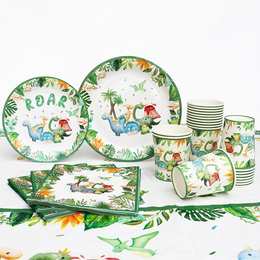 A green and white dinosaur party disposable tableware set featuring plates, cups, and a banner.