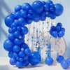 A large blue balloon garland arch decorated with white stripes and blue stars, suitable for parties.