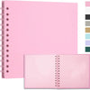 A pink spiral-bound notebook with a pink cover and a vertical color palette swatch on the right.