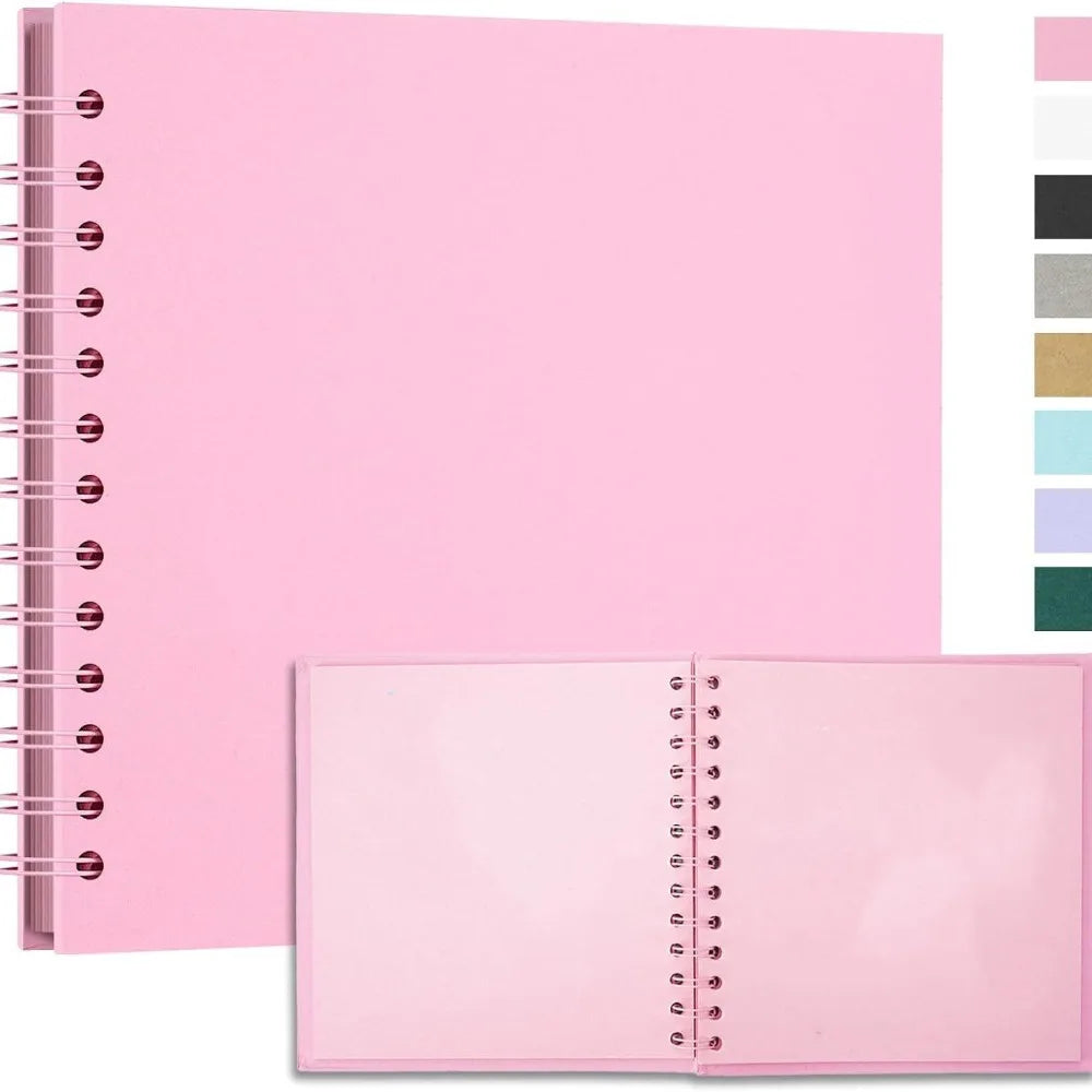 A pink spiral-bound notebook with a pink cover and a vertical color palette swatch on the right.