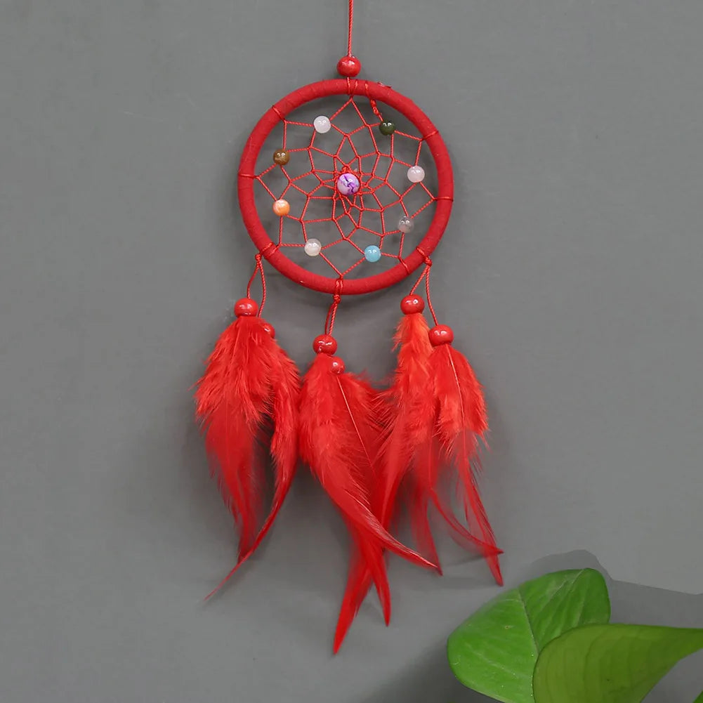 Red handmade feather dreamcatcher wall decor with colorful beads and long red feathers