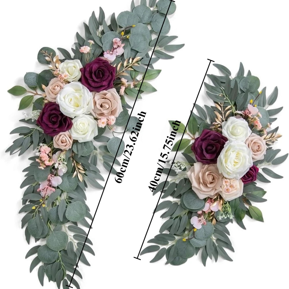 A floral kit featuring dusty rose and white roses with blue eucalyptus greenery for a wedding arch.