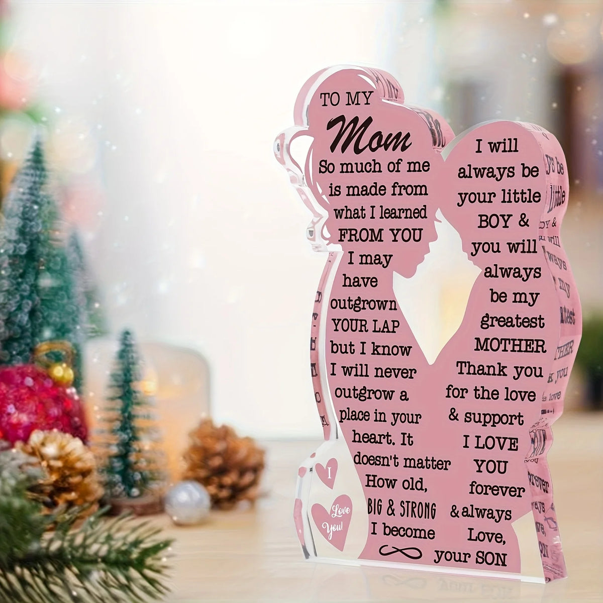 A personalized acrylic plaque shaped like a woman's silhouette with text dedicated to her mother.