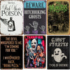 A collection of five metal tin signs featuring gothic and spooky themes like Be ware Hitchhiking Ghosts The Munsters and Ghos