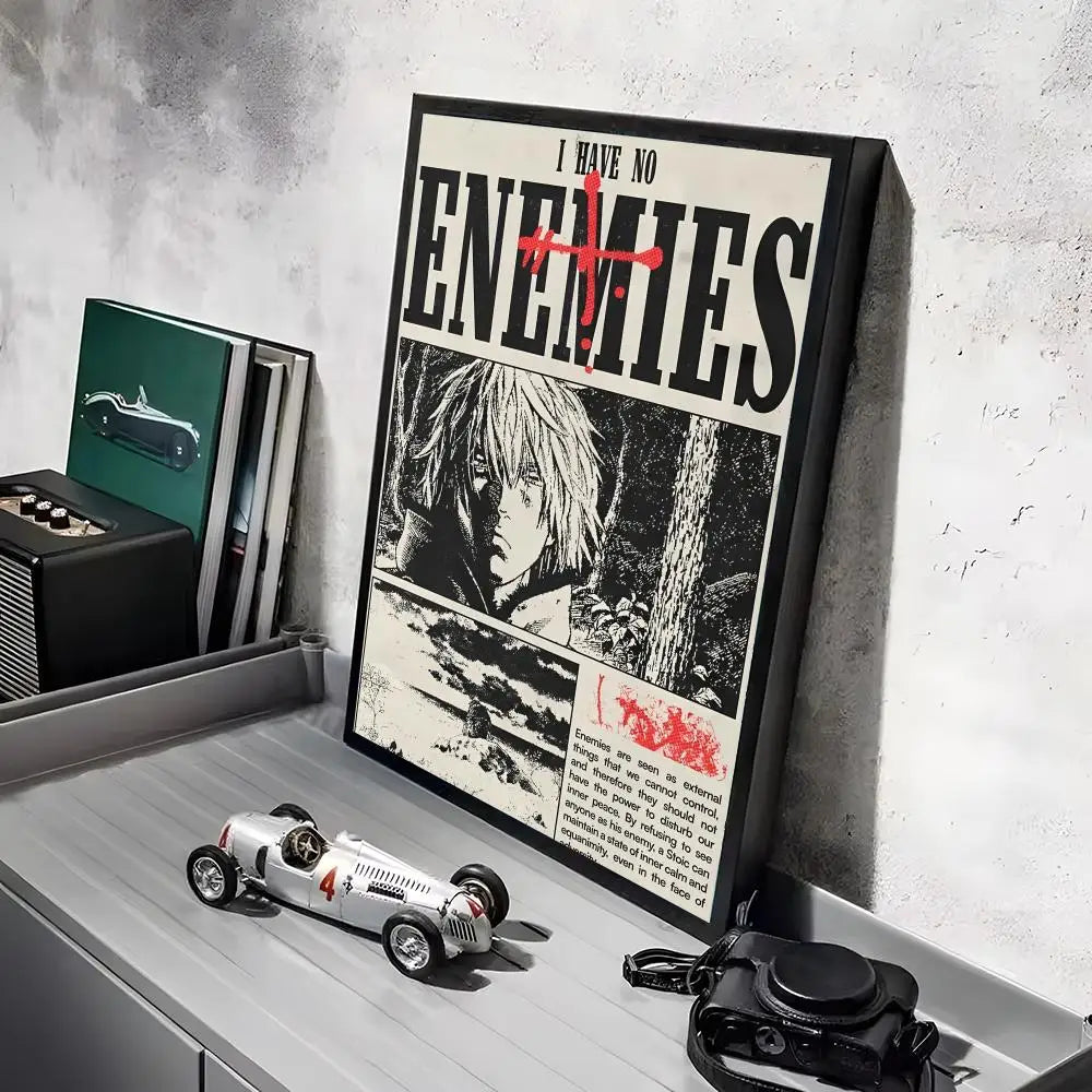 A framed poster featuring a black and white image of a character from Vinland Saga anime, displayed on a gray shelf.