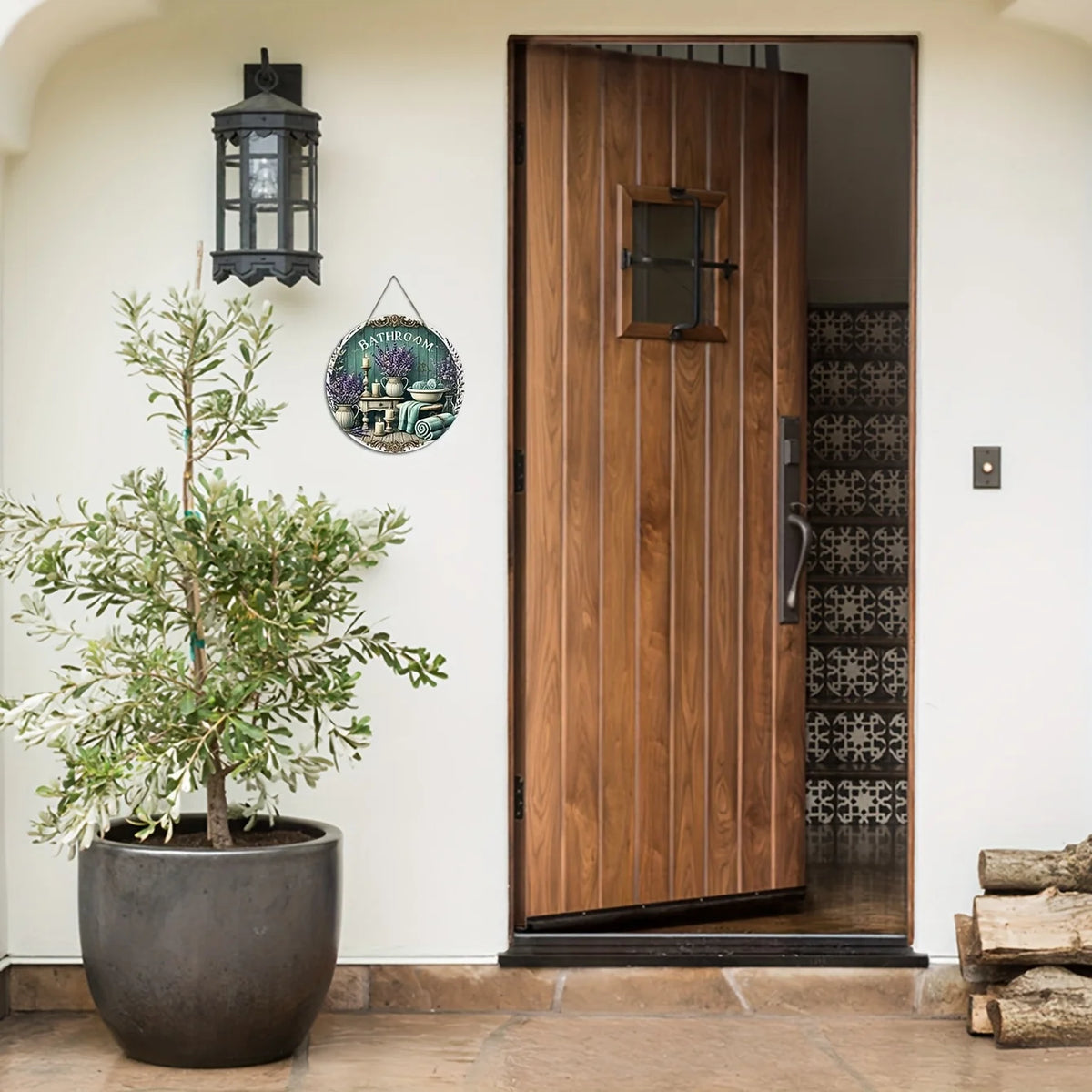 A rustic wooden door with a glass panel and decorative metalwork, set in a bright interior doorway.