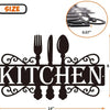 Black metal wall art sign with the word KITCHEN surrounded by decorative forks and spoons