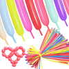 A collection of colorful twisting balloons in various shades including yellow, pink, red, and blue.