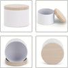A set of white metal candle tins with natural wood lids shown in various angles.